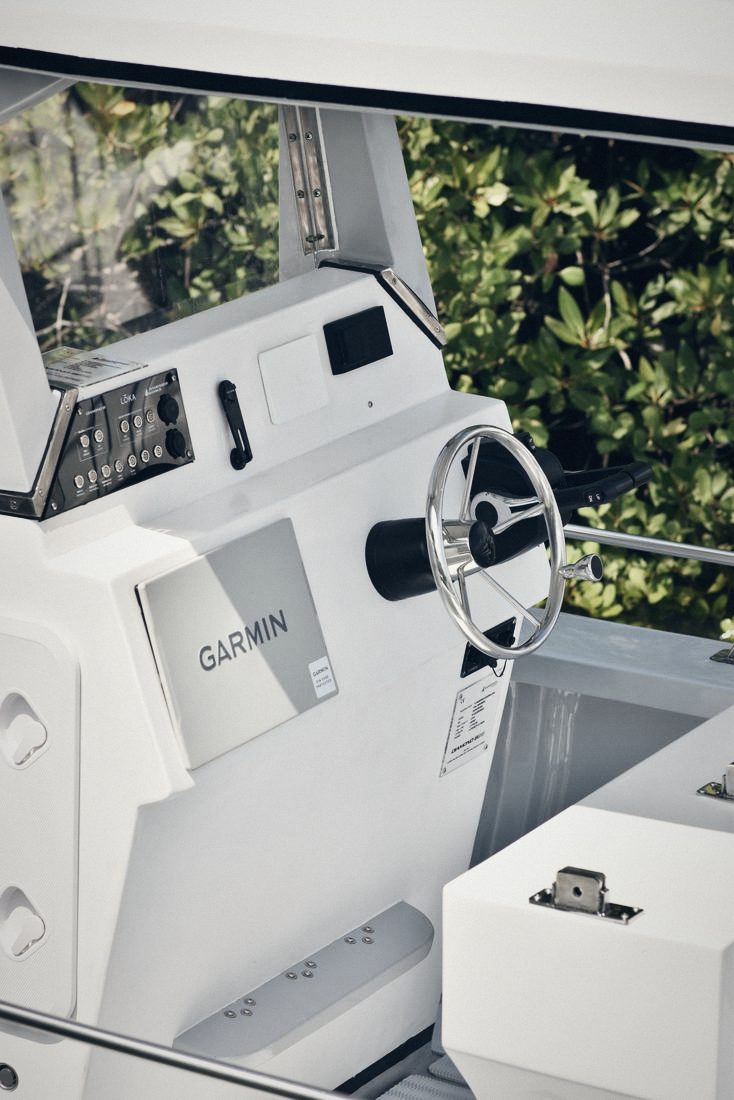 Helm with Garmin and stainless wheel