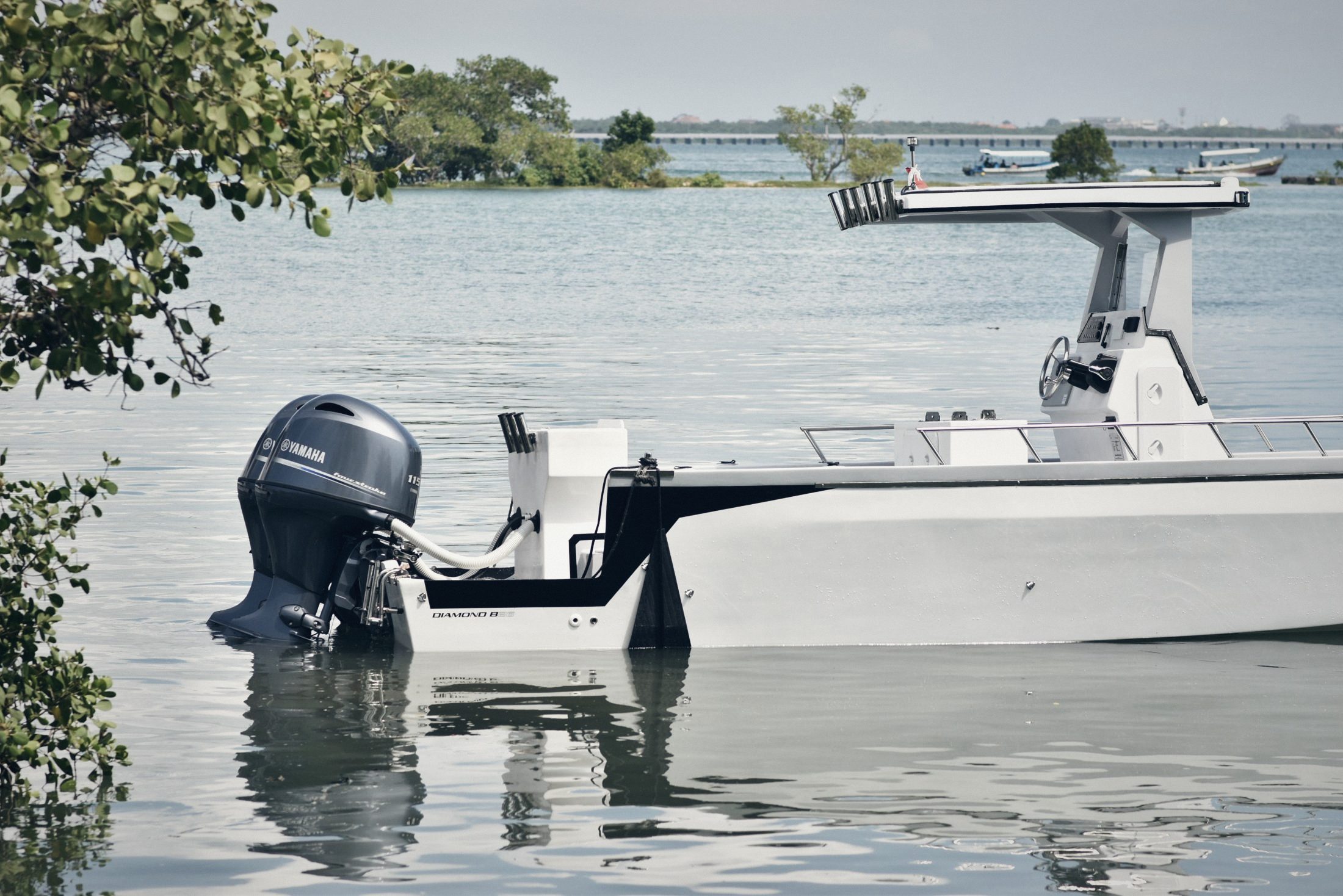 Twin Yamaha 115 outboards on the B26 stern